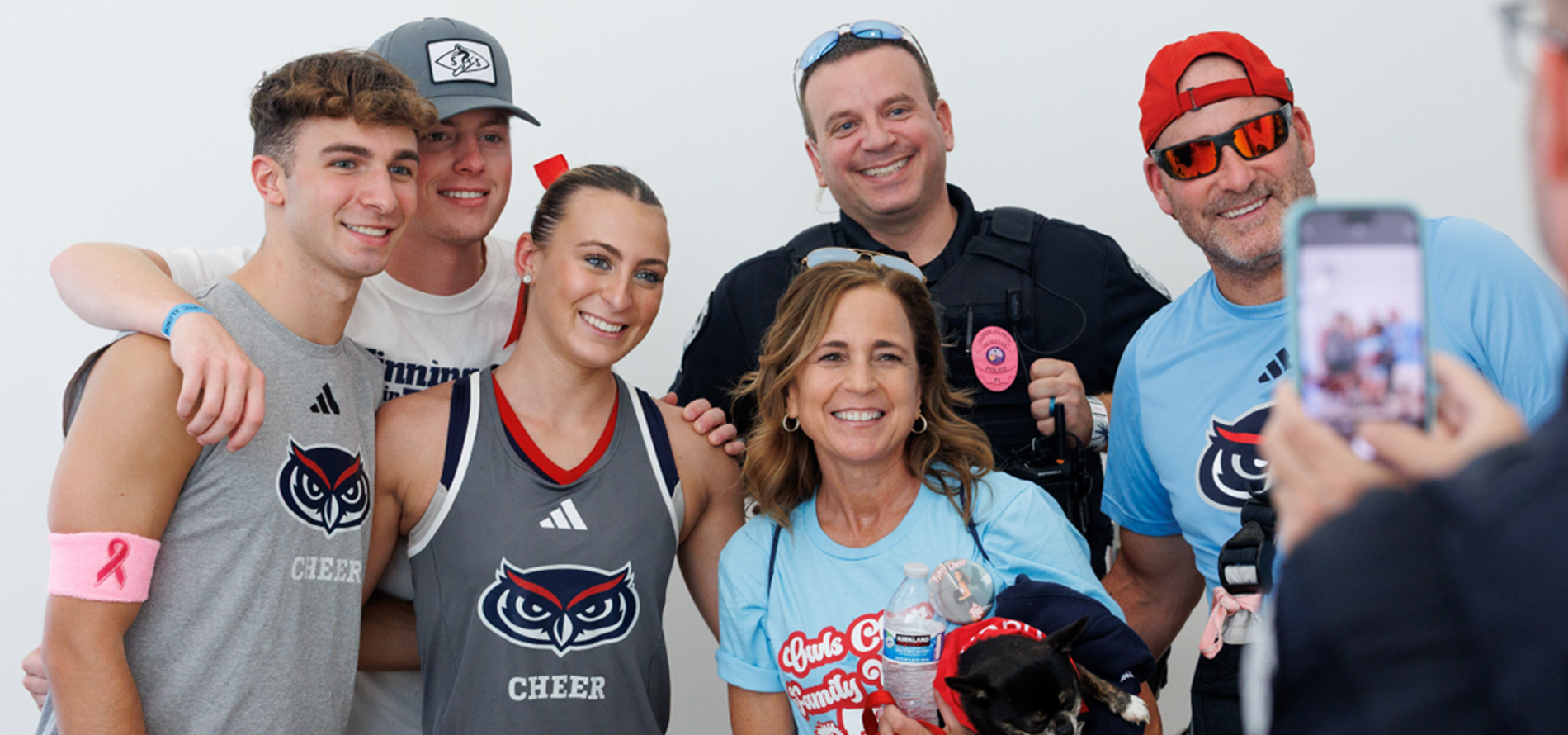 FAU Faculty Members on a laptop with student
