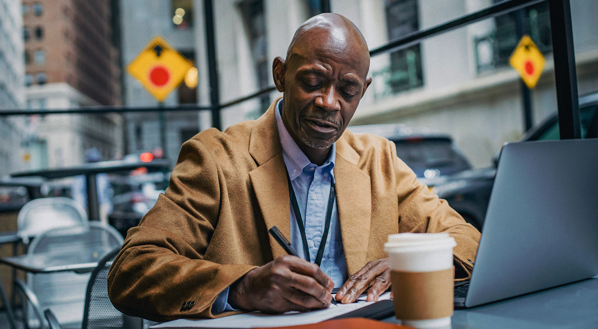 Man working outside on laptop