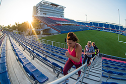 Women running up FAU Stadium for excercise