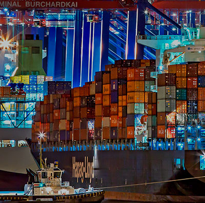 abstract busy background with a cargo ship and buildings in the background