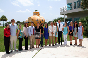 group of students standing outside school building
