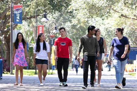 Students walking in the Honors College Campus