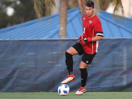 Male soccer player on the soccer field in uniform